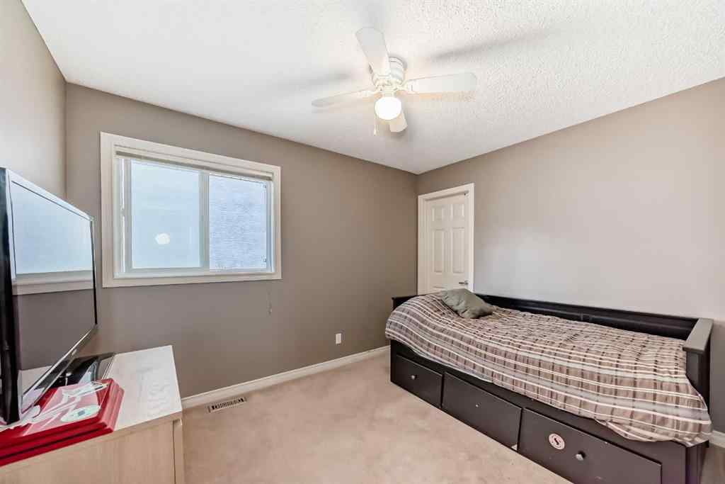 MLS® A2269405 - 73 Crestmont Drive SW in Crestmont Calgary, Residential