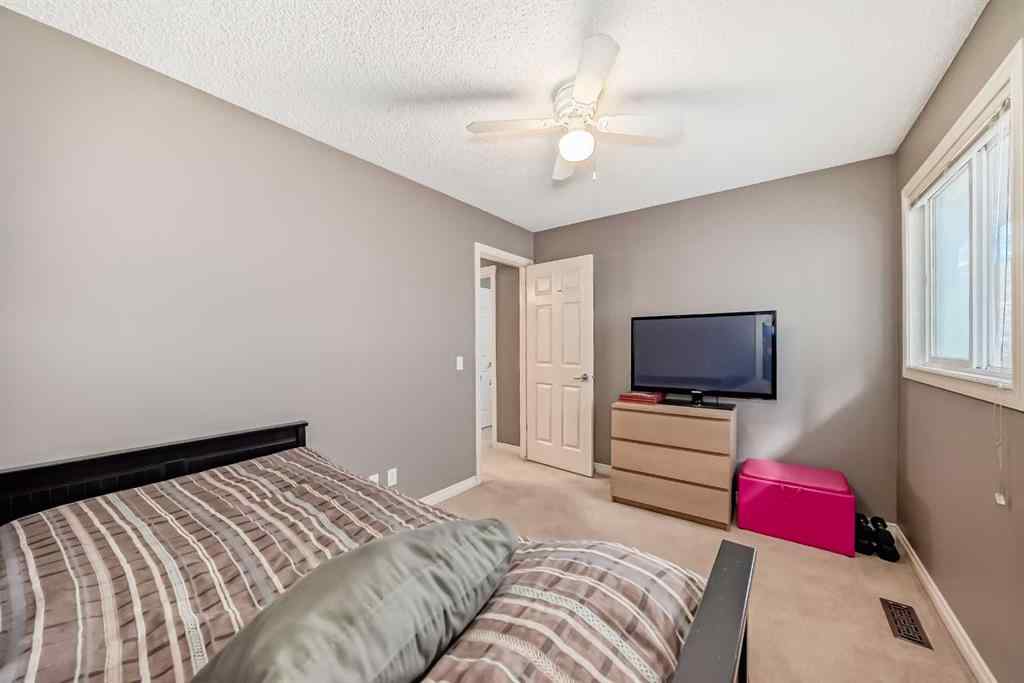 MLS® A2269405 - 73 Crestmont Drive SW in Crestmont Calgary, Residential