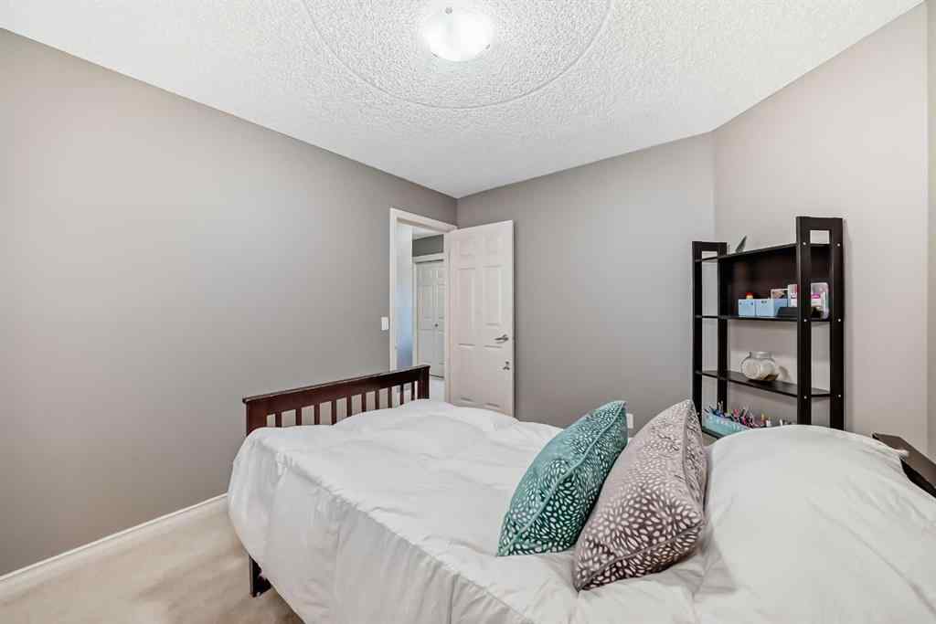 MLS® A2269405 - 73 Crestmont Drive SW in Crestmont Calgary, Residential