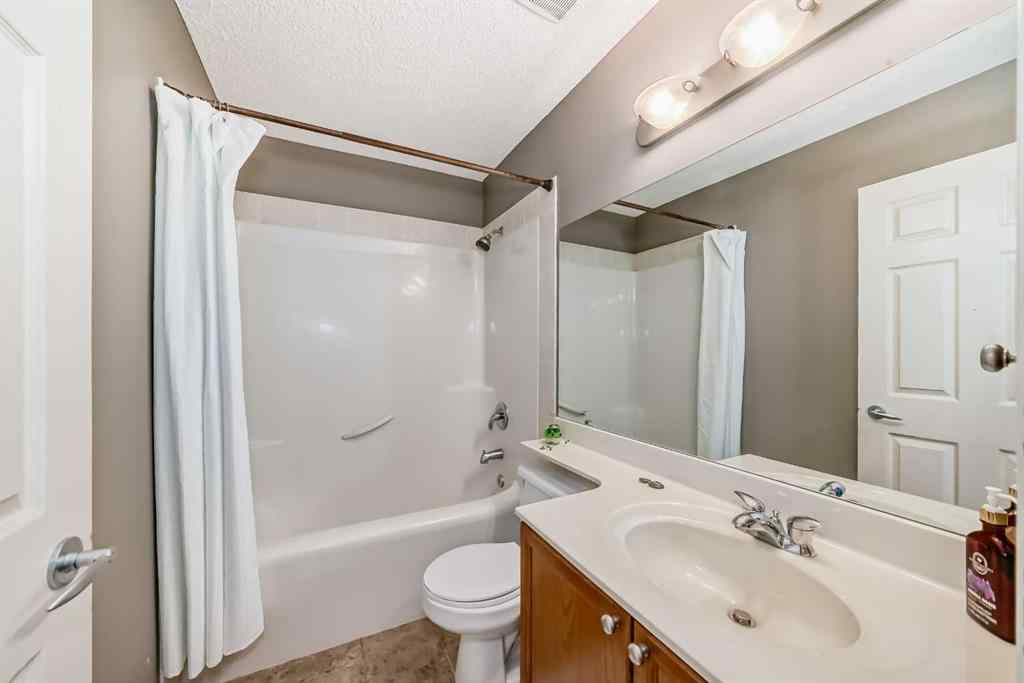 MLS® A2269405 - 73 Crestmont Drive SW in Crestmont Calgary, Residential