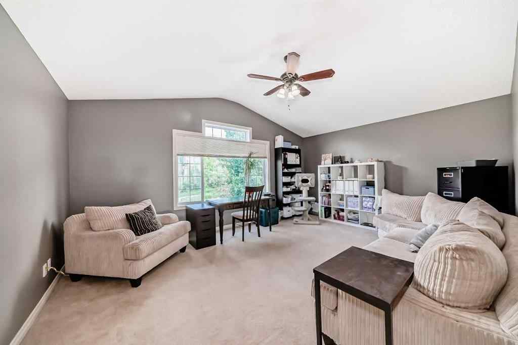 MLS® A2269405 - 73 Crestmont Drive SW in Crestmont Calgary, Residential