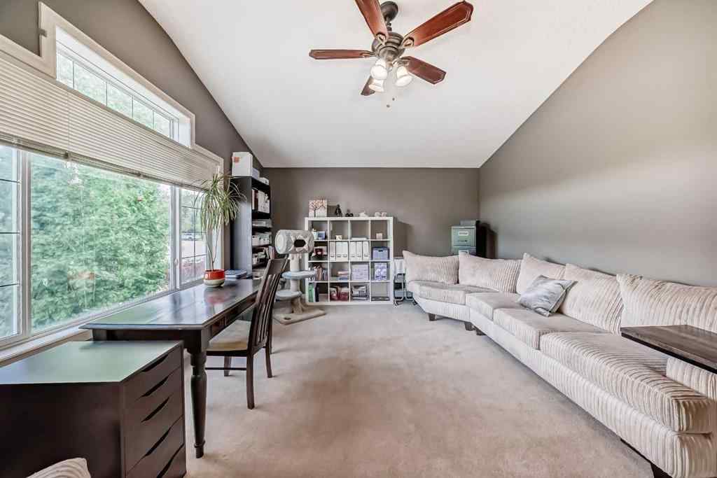 MLS® A2269405 - 73 Crestmont Drive SW in Crestmont Calgary, Residential