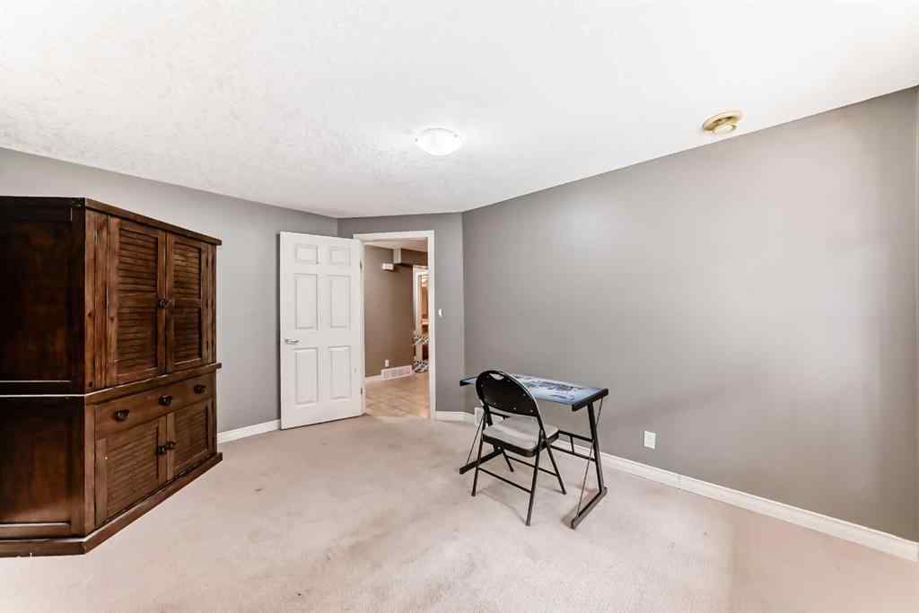 MLS® A2269405 - 73 Crestmont Drive SW in Crestmont Calgary, Residential