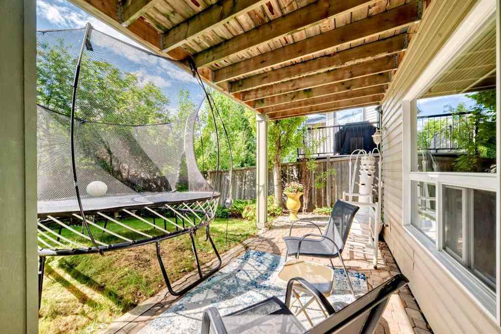 MLS® A2269405 - 73 Crestmont Drive SW in Crestmont Calgary, Residential