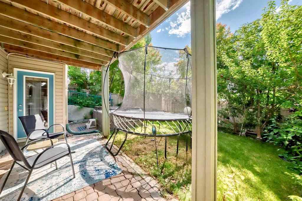 MLS® A2269405 - 73 Crestmont Drive SW in Crestmont Calgary, Residential