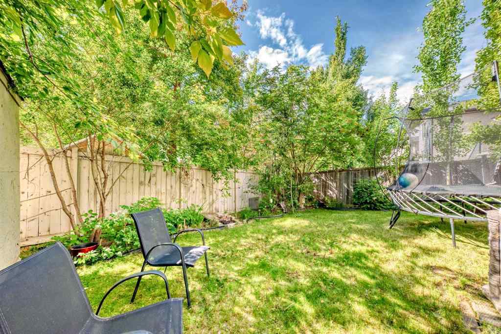 MLS® A2269405 - 73 Crestmont Drive SW in Crestmont Calgary, Residential