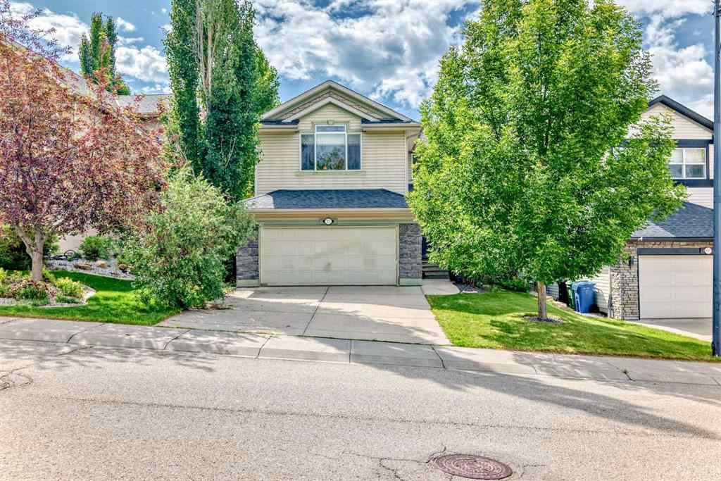 MLS® A2269405 - 73 Crestmont Drive SW in Crestmont Calgary, Residential