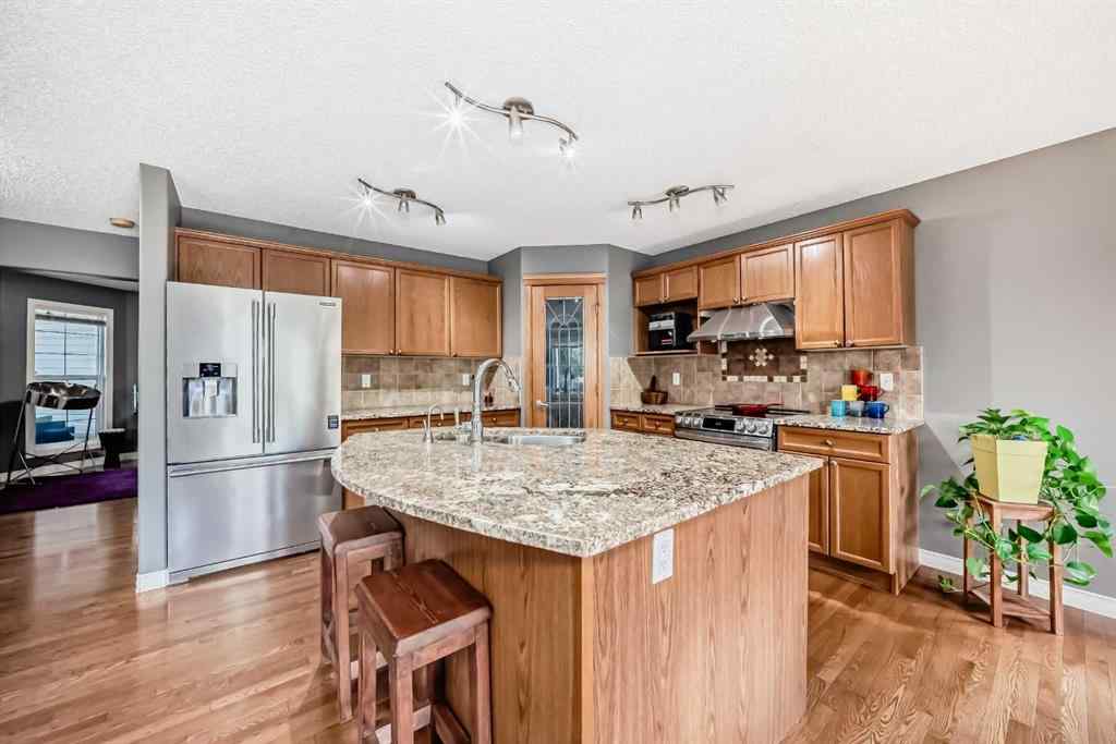 MLS® A2269405 - 73 Crestmont Drive SW in Crestmont Calgary, Residential