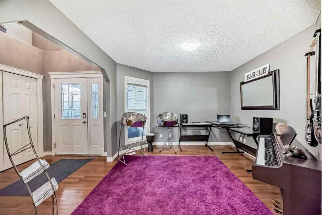 MLS® A2269405 - 73 Crestmont Drive SW in Crestmont Calgary, Residential
