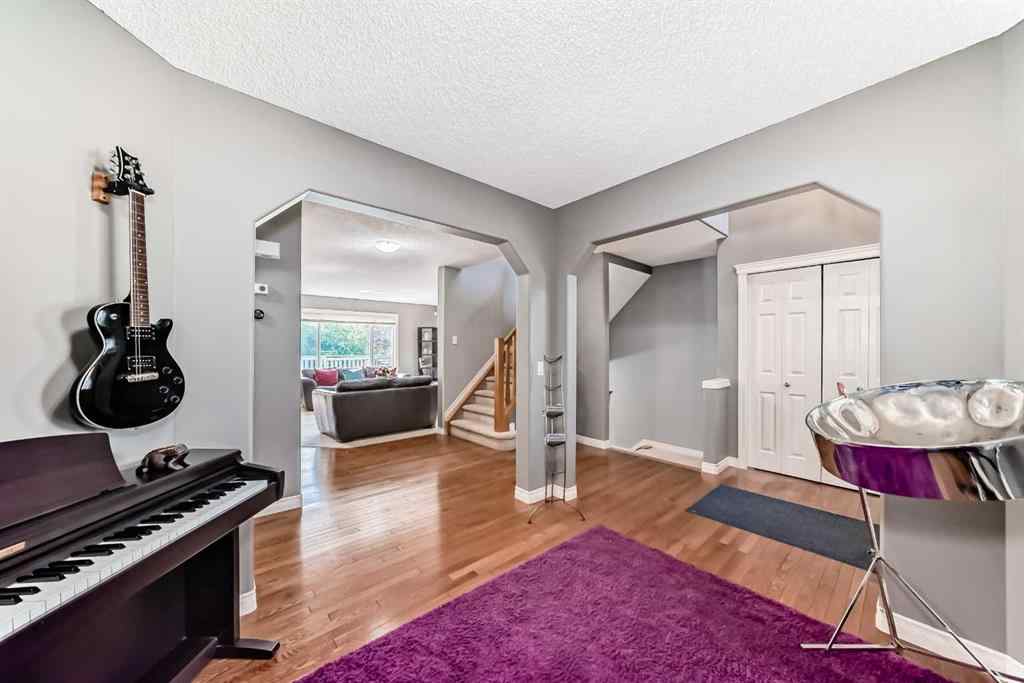 MLS® A2269405 - 73 Crestmont Drive SW in Crestmont Calgary, Residential