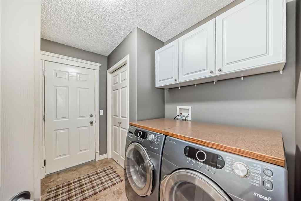 MLS® A2269405 - 73 Crestmont Drive SW in Crestmont Calgary, Residential