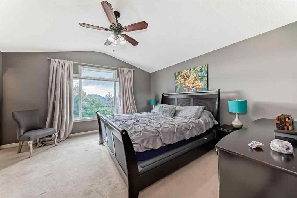 MLS® A2269405 - 73 Crestmont Drive SW in Crestmont Calgary, Residential