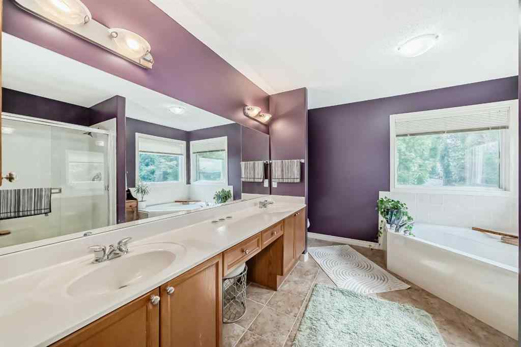 MLS® A2269405 - 73 Crestmont Drive SW in Crestmont Calgary, Residential