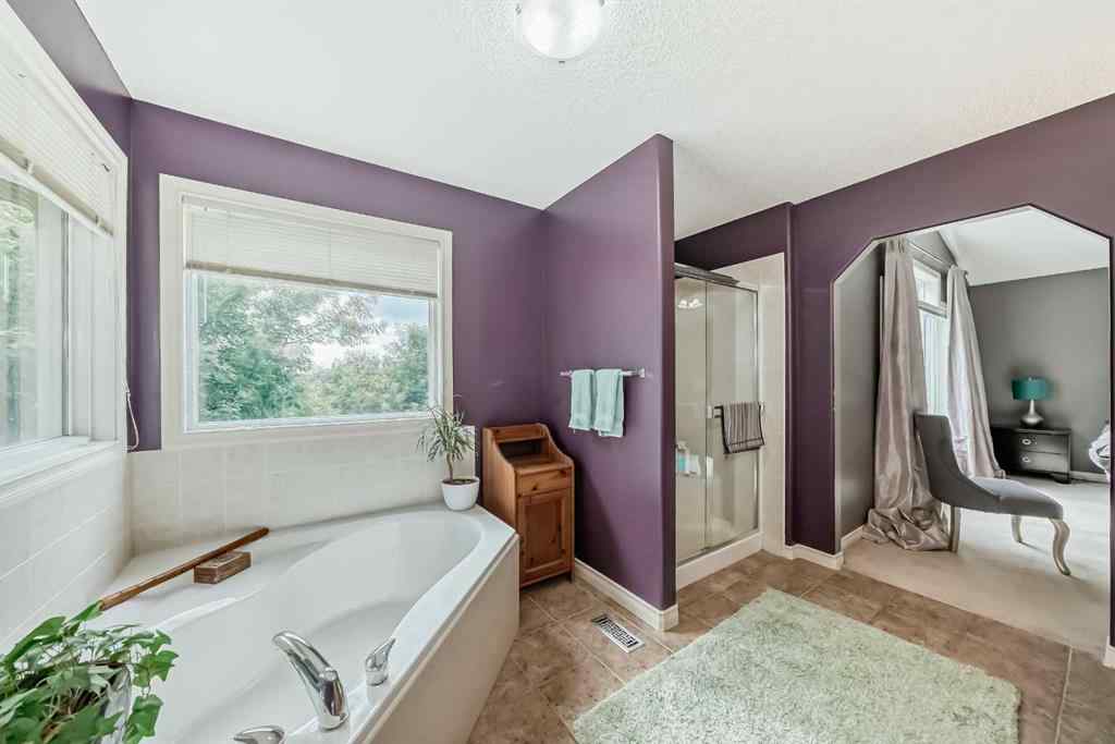MLS® A2269405 - 73 Crestmont Drive SW in Crestmont Calgary, Residential