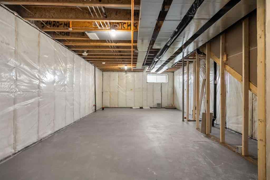 MLS® A2269413 - 487 Hotchkiss Manor SE in Hotchkiss Calgary, Residential