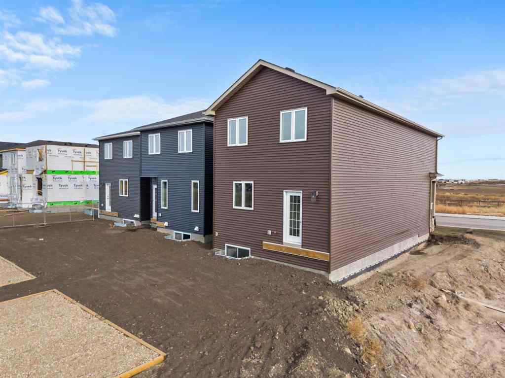 MLS® A2269413 - 487 Hotchkiss Manor SE in Hotchkiss Calgary, Residential