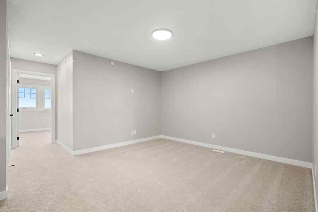 MLS® A2269413 - 487 Hotchkiss Manor SE in Hotchkiss Calgary, Residential