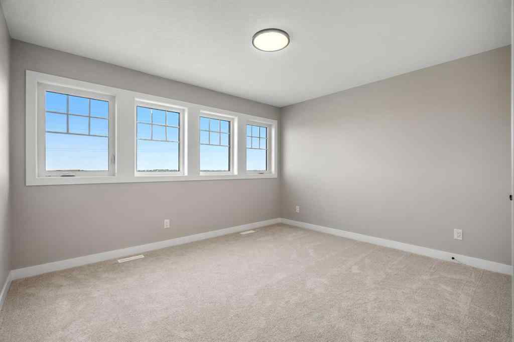 MLS® A2269413 - 487 Hotchkiss Manor SE in Hotchkiss Calgary, Residential