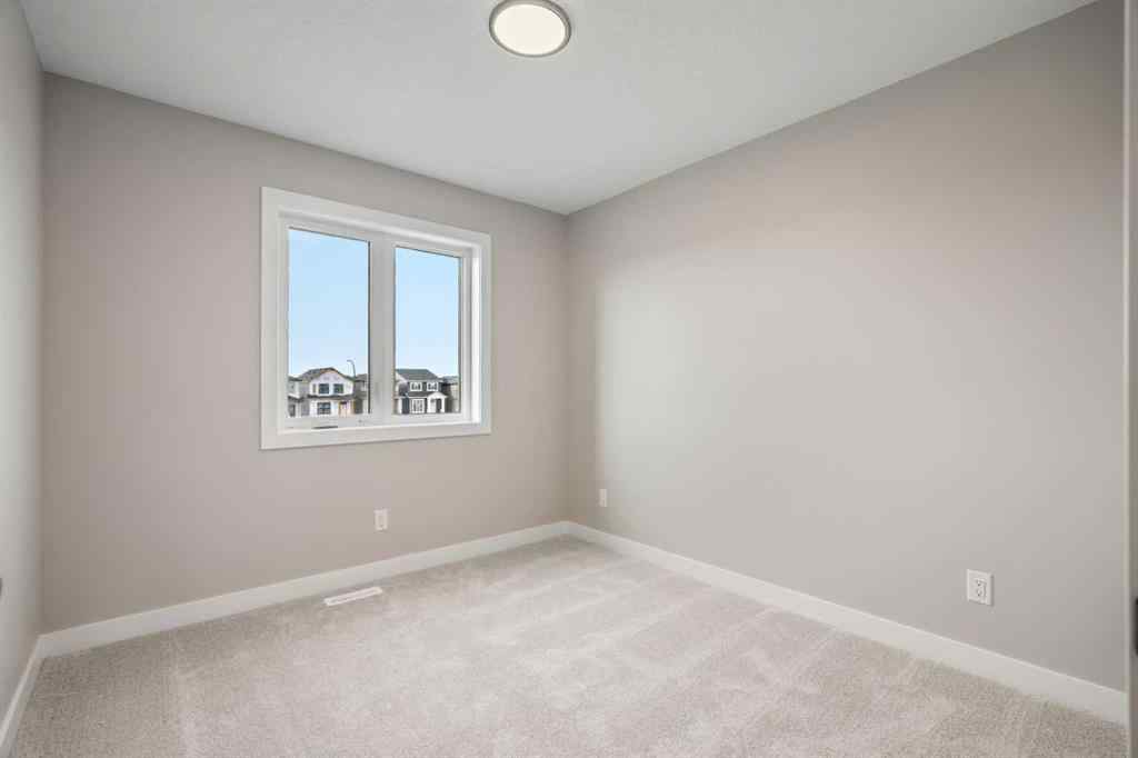 MLS® A2269413 - 487 Hotchkiss Manor SE in Hotchkiss Calgary, Residential