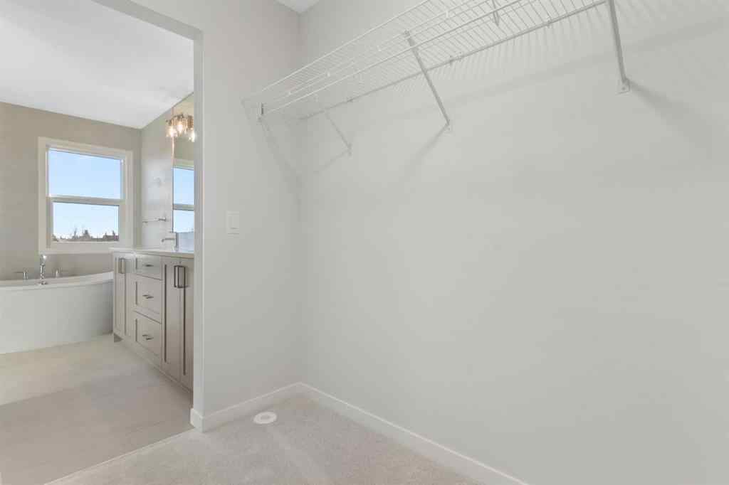 MLS&reg; # A2269417 - 218 West Grove Lane SW in West Springs Calgary, Residential Open Houses