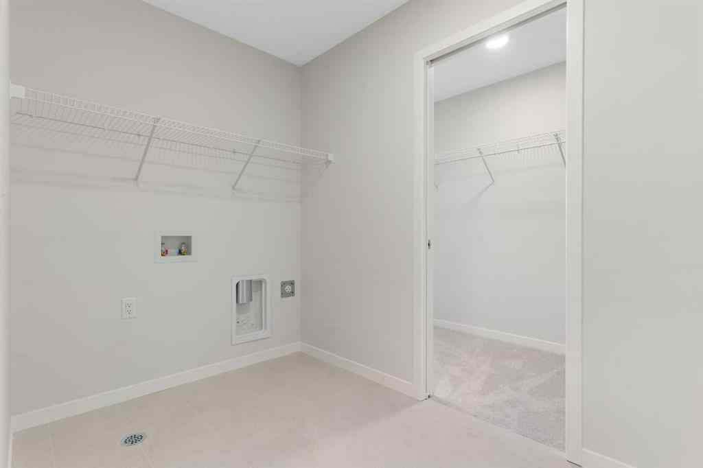 MLS&reg; # A2269417 - 218 West Grove Lane SW in West Springs Calgary, Residential Open Houses