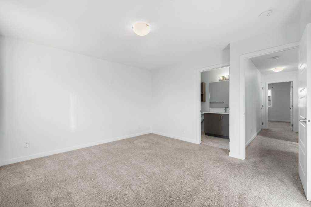 MLS® A2269440 - 64 Creekside Boulevard SW in Pine Creek Calgary, Residential