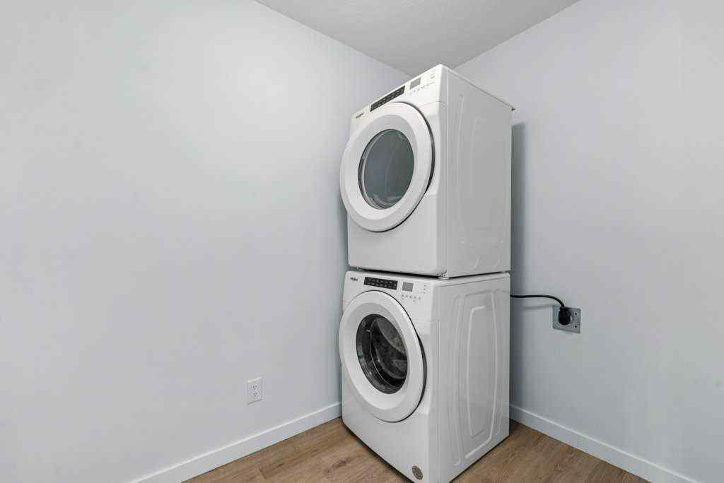 MLS® A2269440 - 64 Creekside Boulevard SW in Pine Creek Calgary, Residential