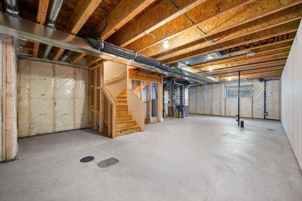 MLS® A2269440 - 64 Creekside Boulevard SW in Pine Creek Calgary, Residential