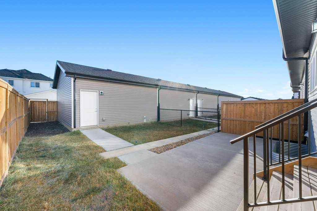 MLS® A2269440 - 64 Creekside Boulevard SW in Pine Creek Calgary, Residential