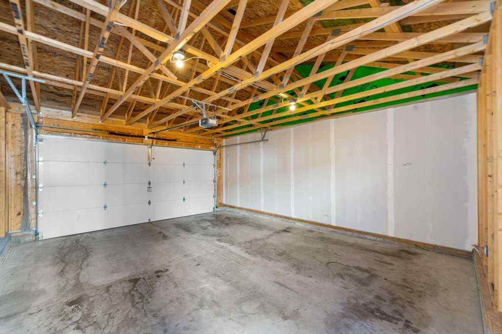 MLS® A2269440 - 64 Creekside Boulevard SW in Pine Creek Calgary, Residential