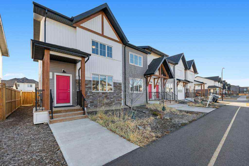 MLS® A2269440 - 64 Creekside Boulevard SW in Pine Creek Calgary, Residential