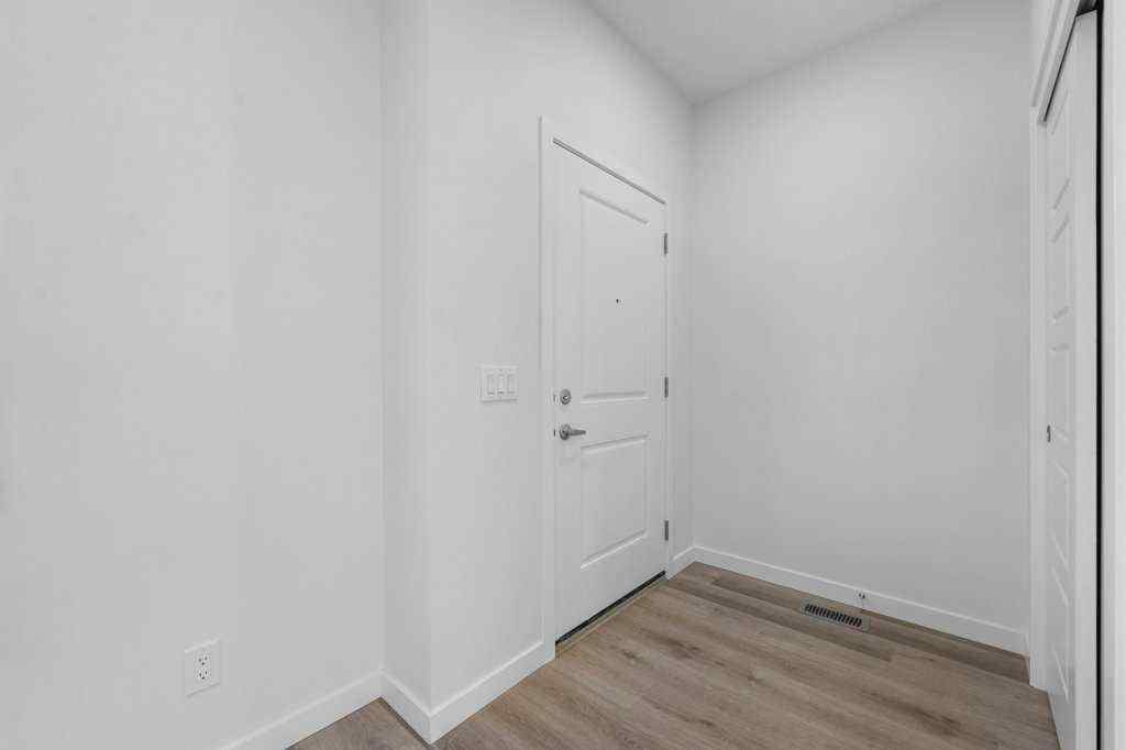 MLS® A2269440 - 64 Creekside Boulevard SW in Pine Creek Calgary, Residential