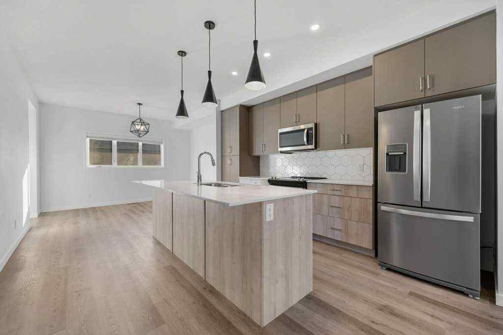 MLS® A2269440 - 64 Creekside Boulevard SW in Pine Creek Calgary, Residential