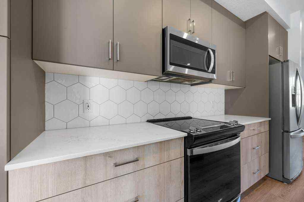 MLS® A2269440 - 64 Creekside Boulevard SW in Pine Creek Calgary, Residential