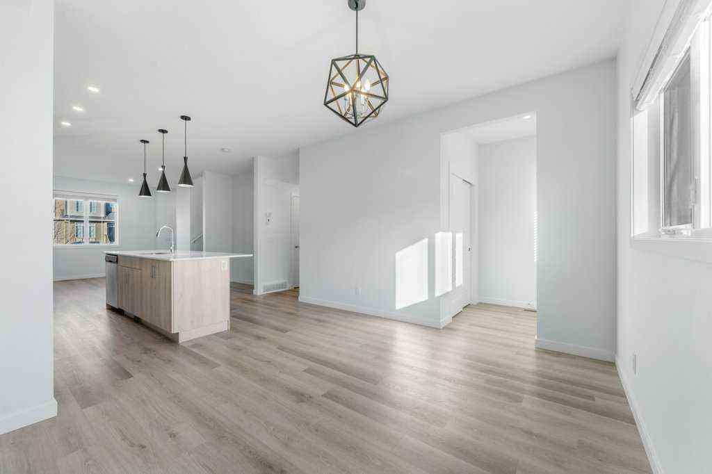 MLS® A2269440 - 64 Creekside Boulevard SW in Pine Creek Calgary, Residential