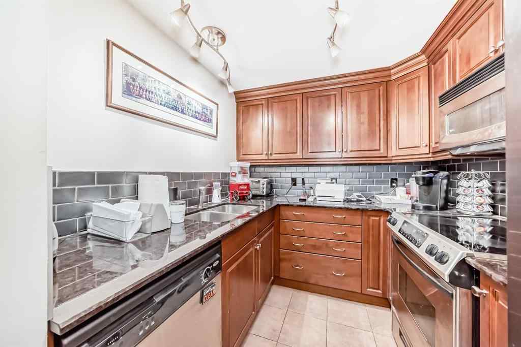 MLS&reg; # A2269448 - Unit #503 922 5 Avenue SW in Downtown Commercial Core Calgary, Commercial Open Houses