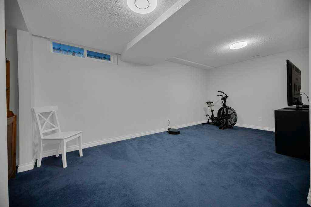 MLS® A2269480 - 164 Mckerrell Crescent SE in McKenzie Lake Calgary, Residential