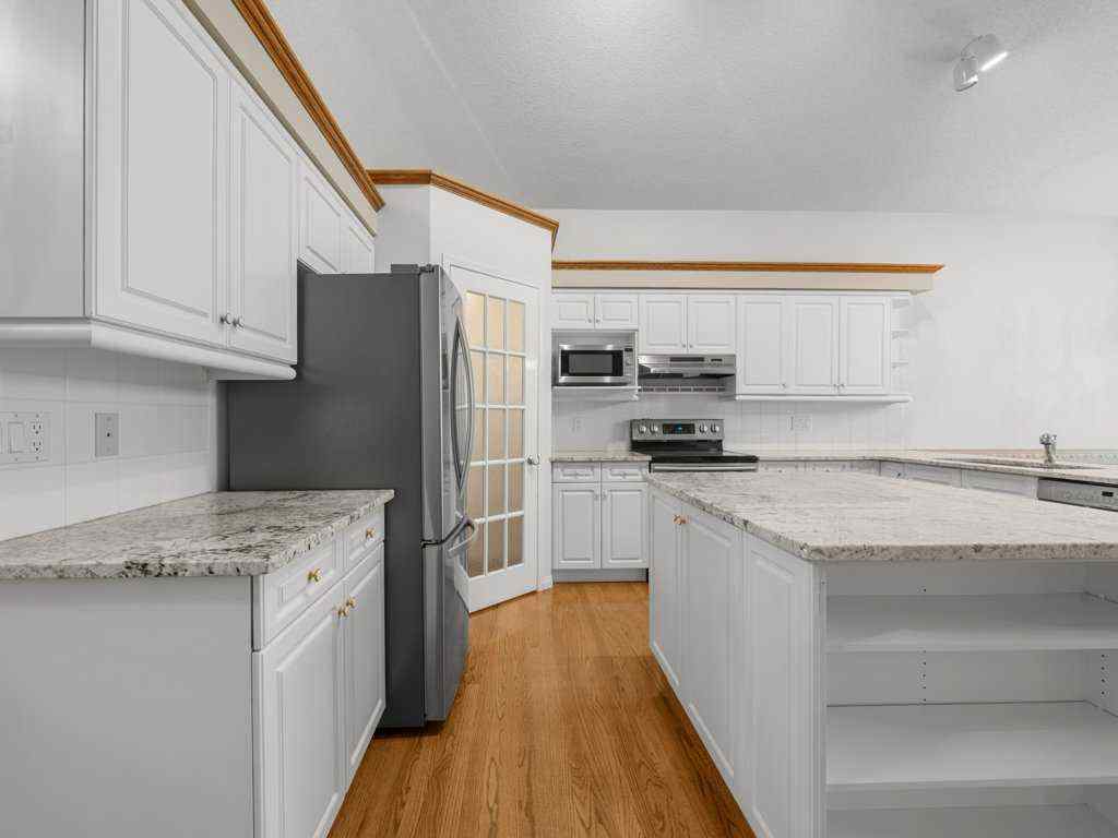 MLS® A2269490 - 38 Tuscany Hills Road NW in Tuscany Calgary, Residential