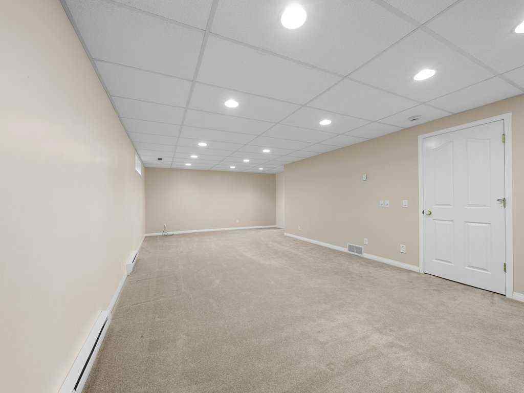 MLS® A2269490 - 38 Tuscany Hills Road NW in Tuscany Calgary, Residential