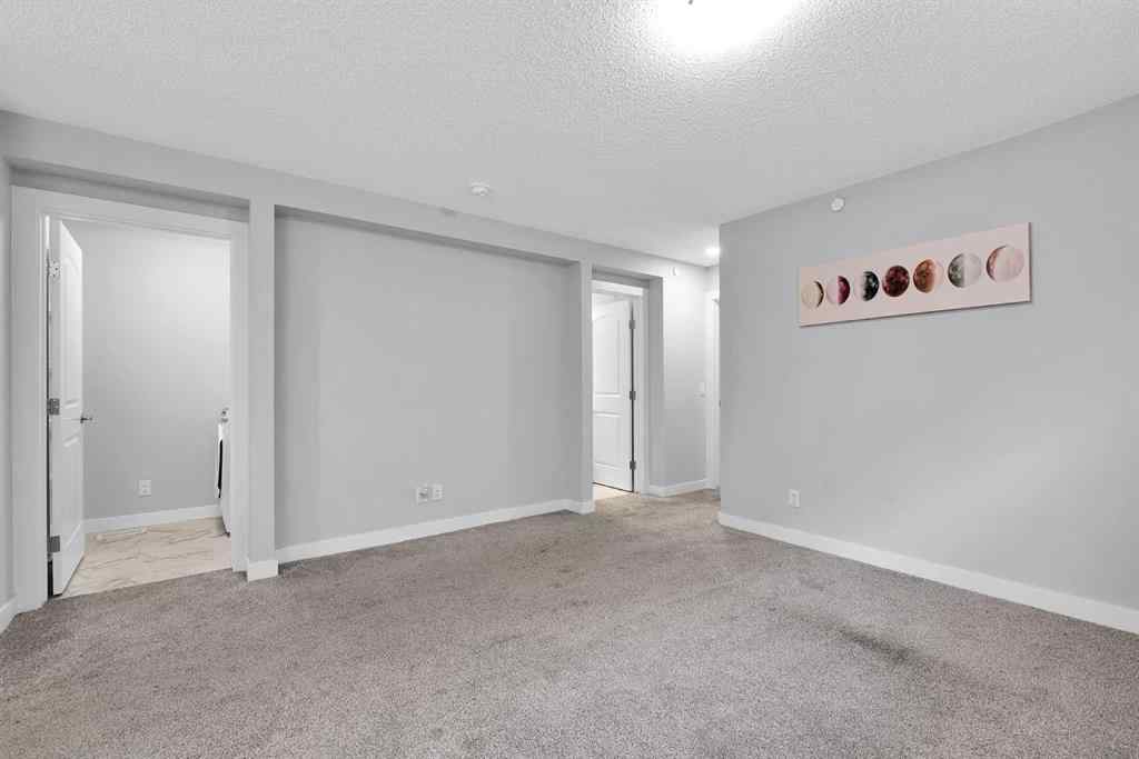 MLS® A2269494 - 349 Calhoun Common NE in Livingston Calgary, Residential