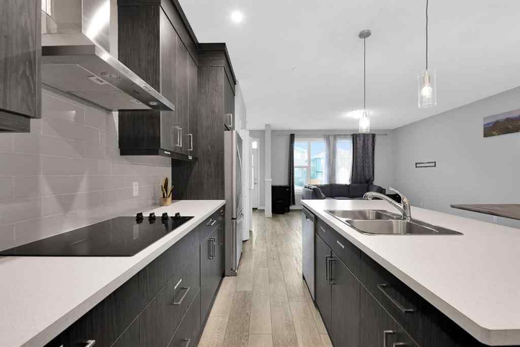 MLS® A2269494 - 349 Calhoun Common NE in Livingston Calgary, Residential