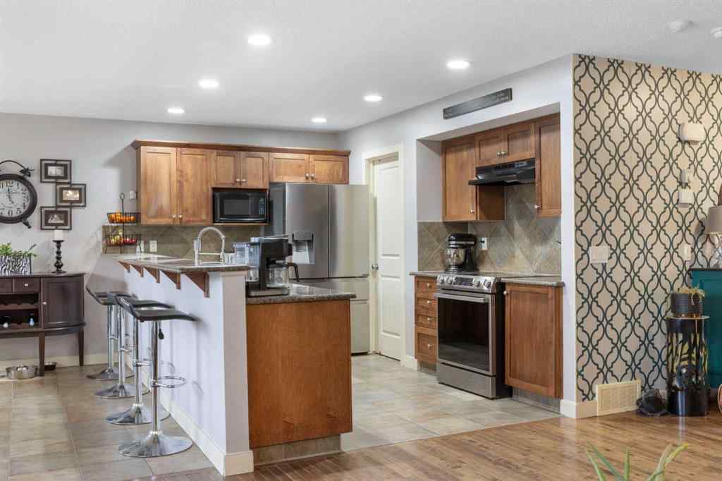 MLS&reg; # A2269501 - 52 Westmount Circle  in Westmount_OK Okotoks, Residential Open Houses