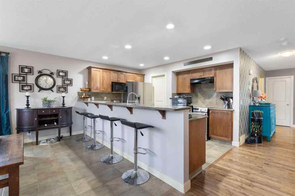 MLS&reg; # A2269501 - 52 Westmount Circle  in Westmount_OK Okotoks, Residential Open Houses