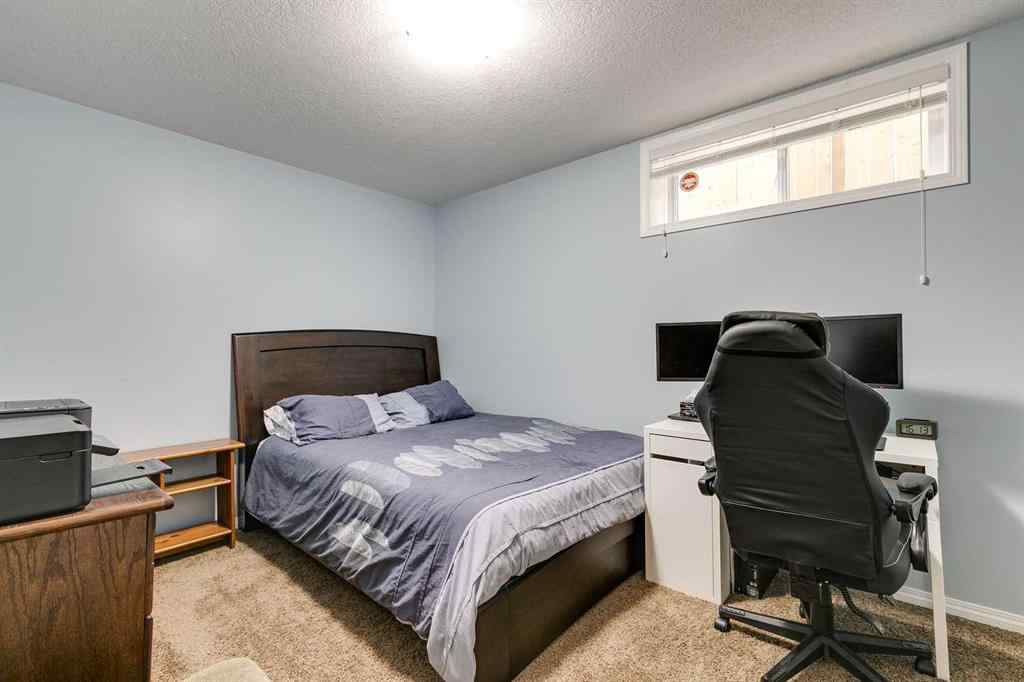 MLS® A2269508 - 113 Rockbluff Place NW in Rocky Ridge Calgary, Residential