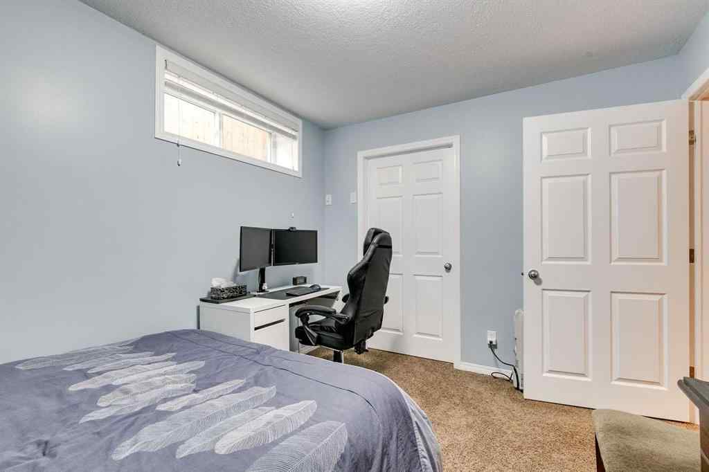 MLS® A2269508 - 113 Rockbluff Place NW in Rocky Ridge Calgary, Residential