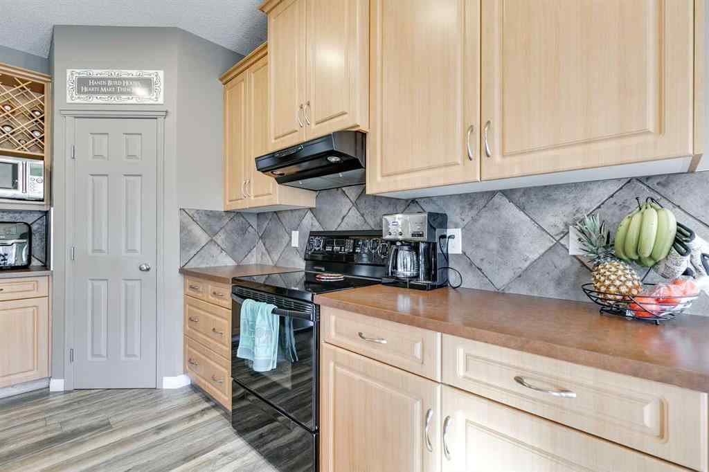 MLS® A2269508 - 113 Rockbluff Place NW in Rocky Ridge Calgary, Residential