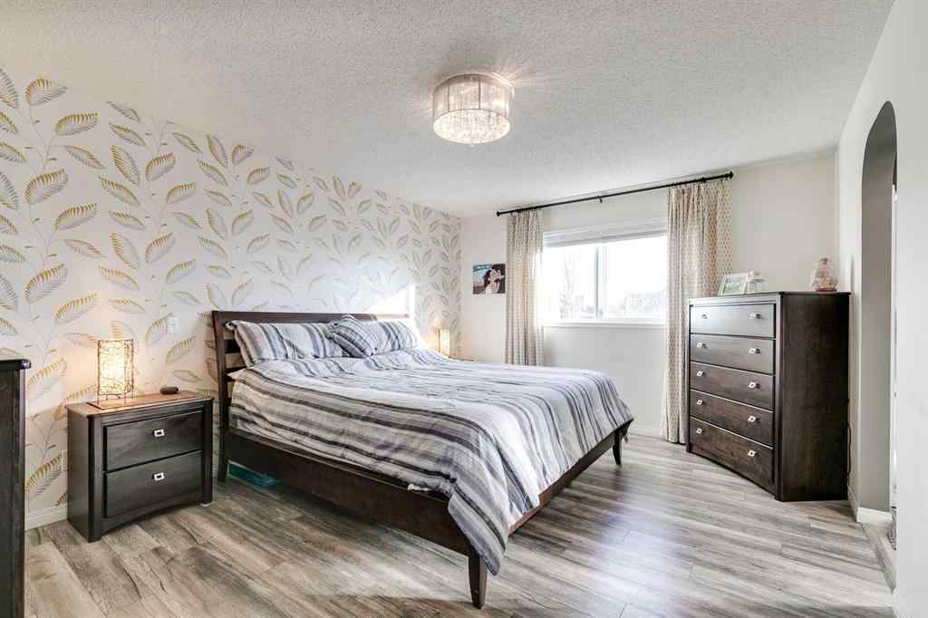 MLS® A2269508 - 113 Rockbluff Place NW in Rocky Ridge Calgary, Residential