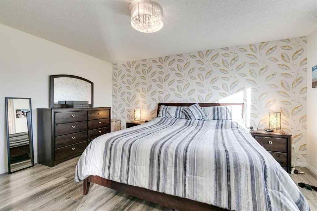 MLS® A2269508 - 113 Rockbluff Place NW in Rocky Ridge Calgary, Residential