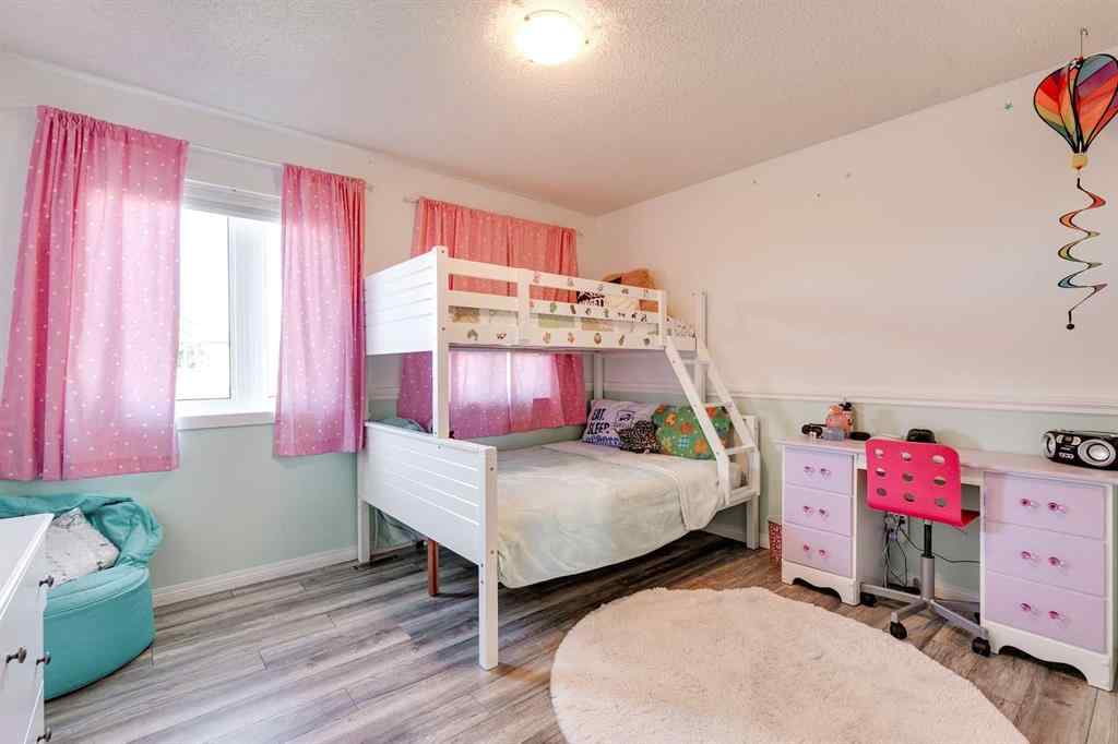 MLS® A2269508 - 113 Rockbluff Place NW in Rocky Ridge Calgary, Residential