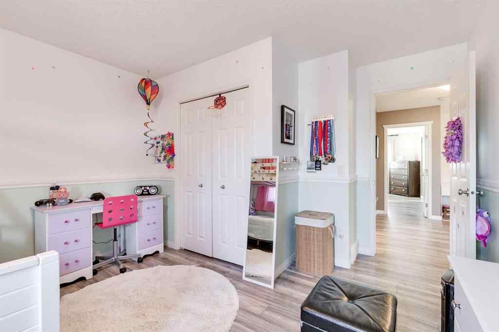 MLS® A2269508 - 113 Rockbluff Place NW in Rocky Ridge Calgary, Residential